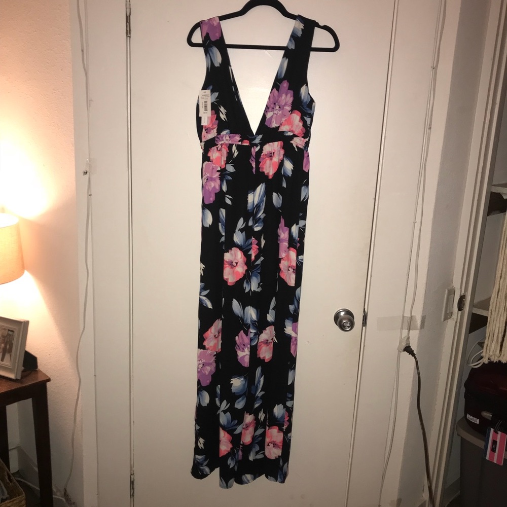 NWT beautiful floral Aqua plunging jumpsuit!
